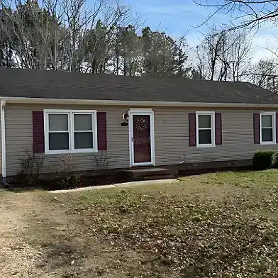 House With Red Shutters